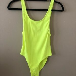 Electric yellow body suit